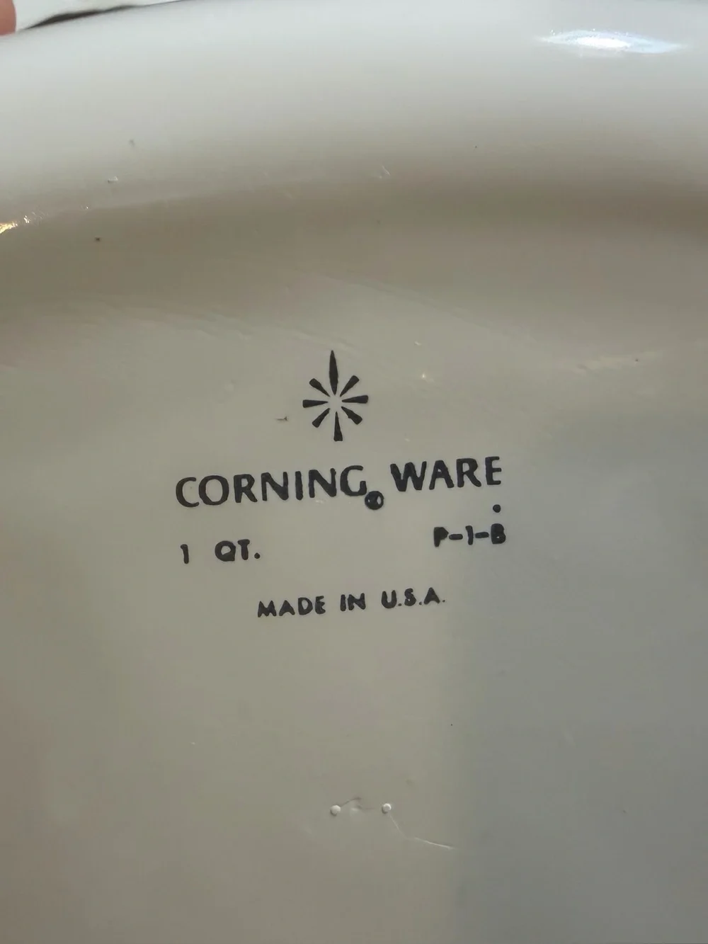 Vintage three-piece set of Corning Ware Blue Cornflower casserole dishes.